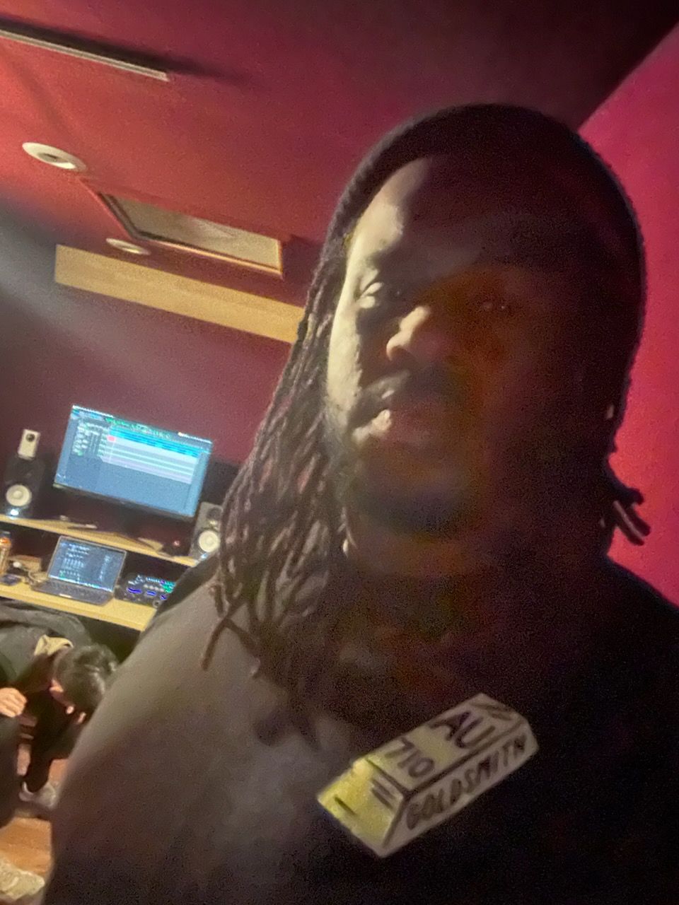MT The Great in the studio with the session running behind him
